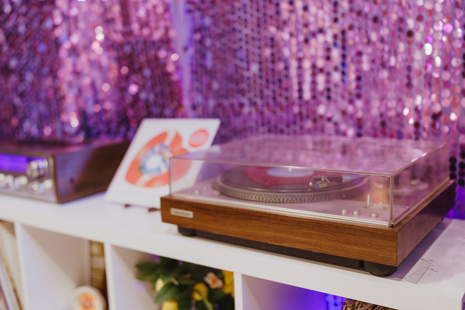 Walnut turntable and amplifier in The Record Lair